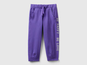 Joggers con stampa glitter