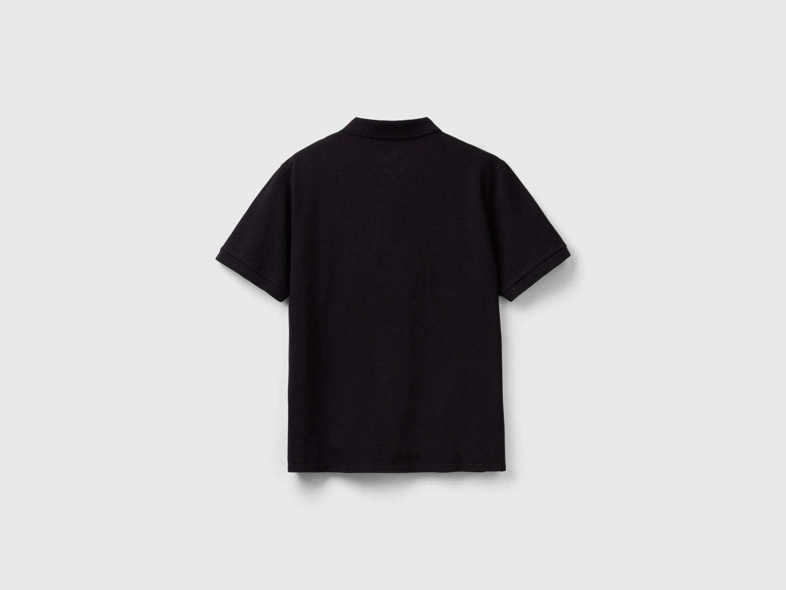 Polo in cotone bio stretch da donna nero 2 | Benetton Outlet