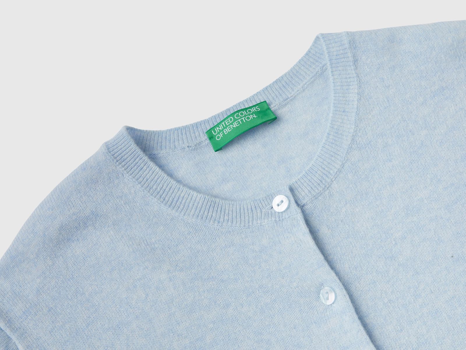 Cardigan girocollo celeste in pura lana Merino da donna azzurro 3 | Benetton Outlet