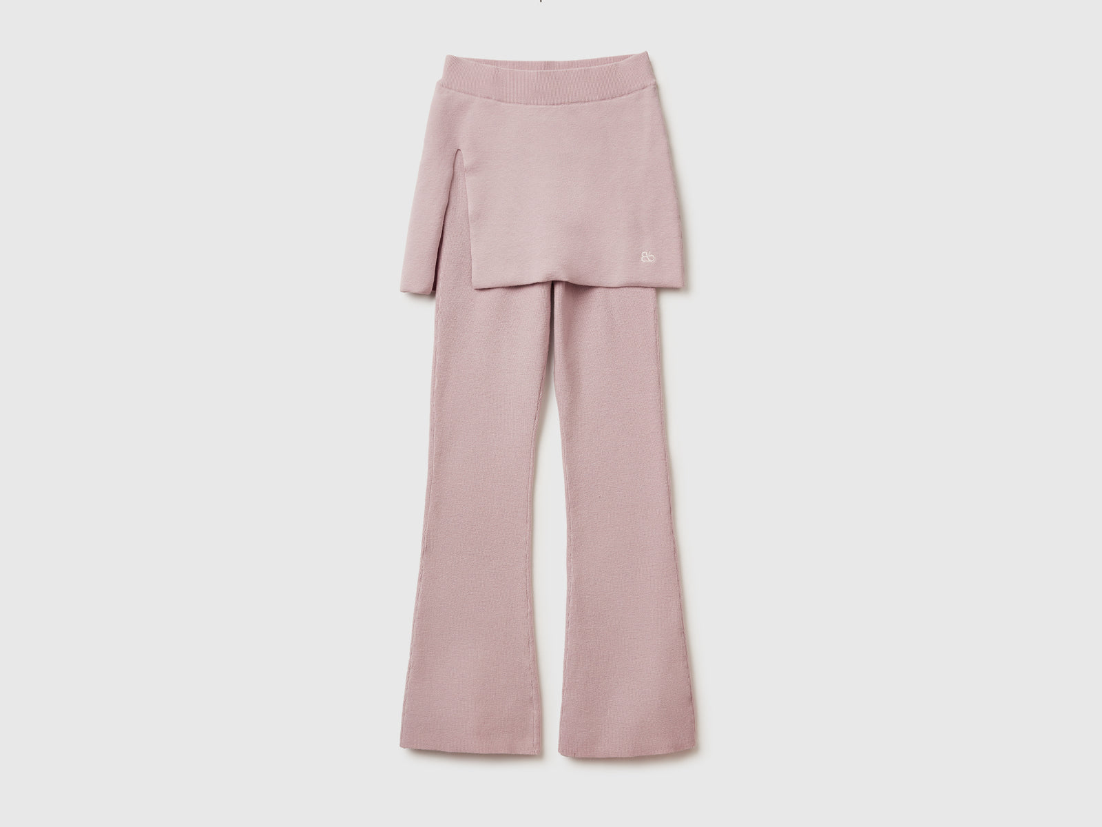 Pantaloni flare con minigonna da donna rosa tenue | Benetton Outlet