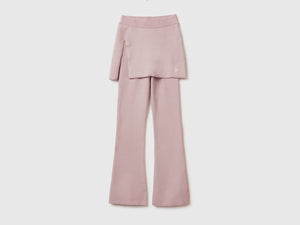 Pantaloni flare con minigonna