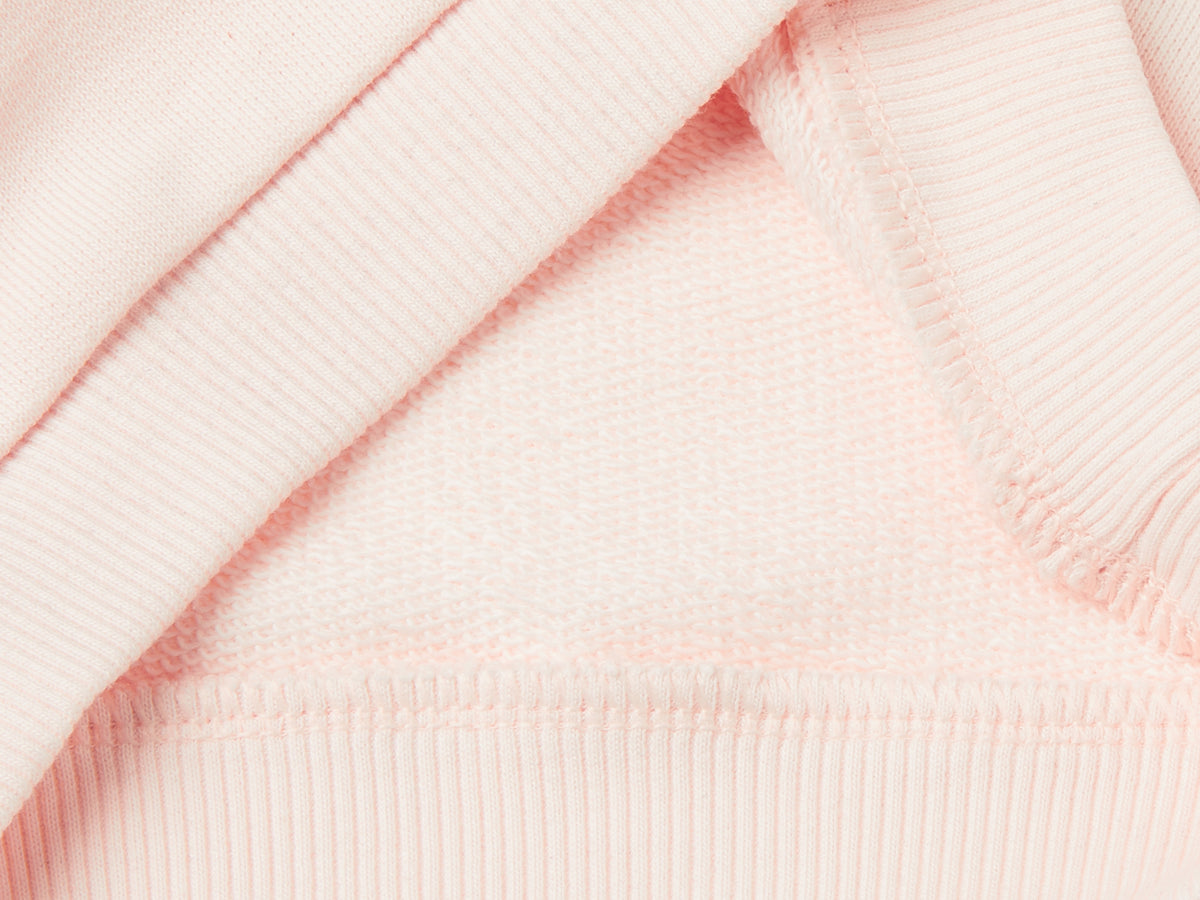 Felpa con ricamo e patch in cotone bio