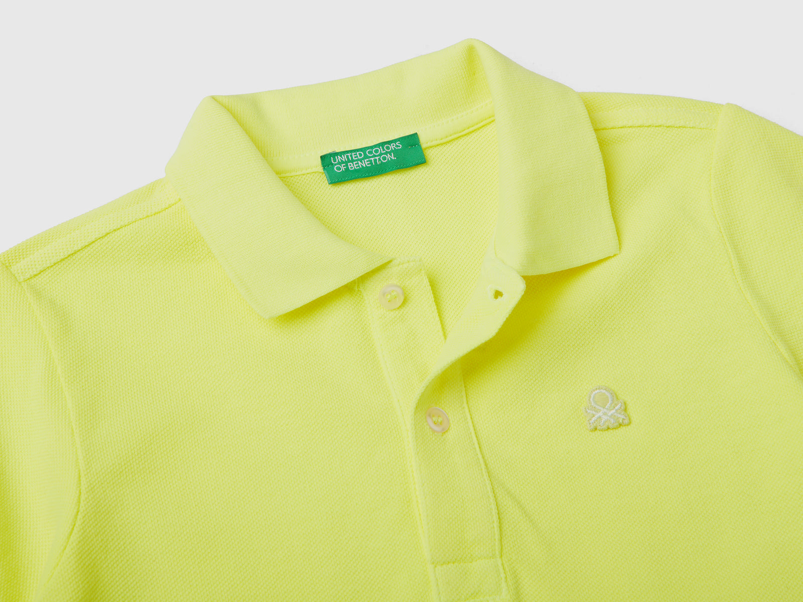 Polo fluo in cotone biologico da bimbo giallo fluo 2 | Benetton Outlet