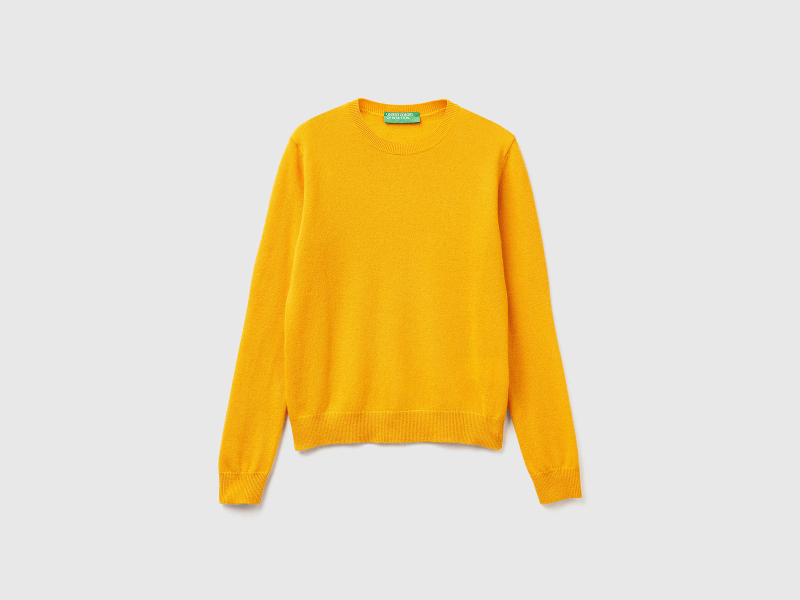 Maglia girocollo giallo ocra in lana Merino da donna senape | Benetton Outlet