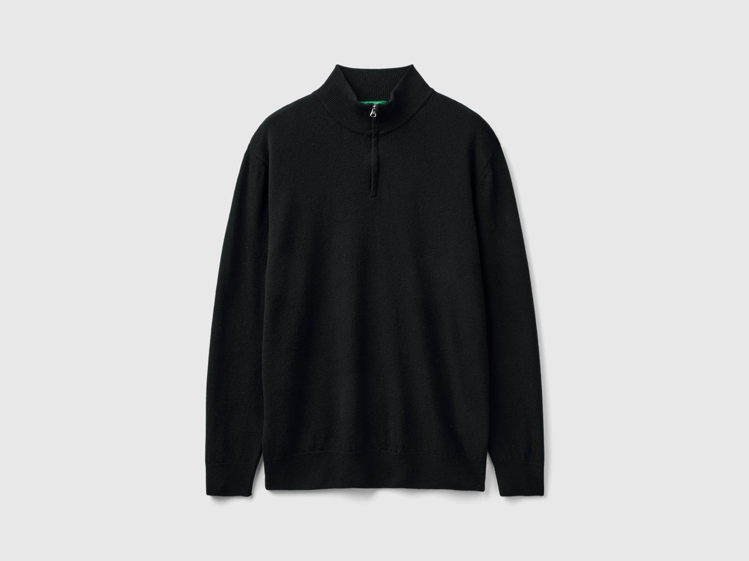 Maglia zippata in 100% lana Merino da uomo nero | Benetton Outlet