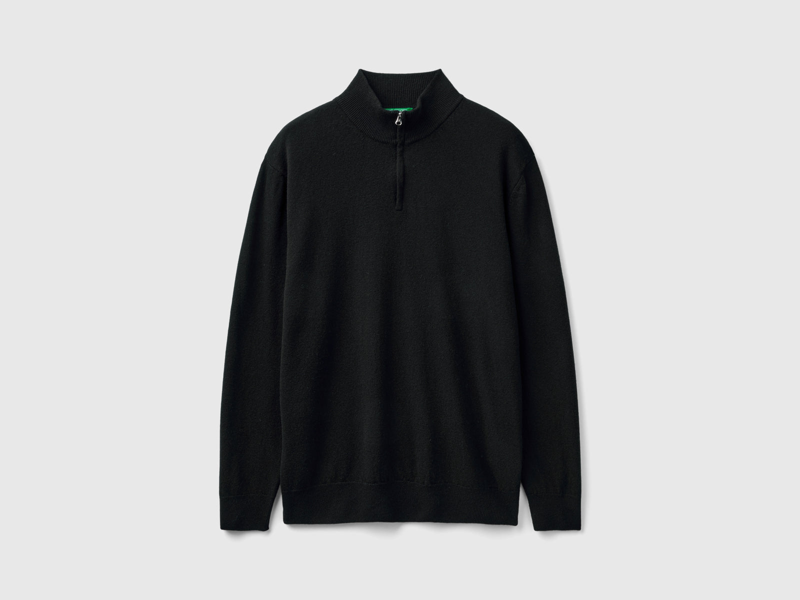 Maglia zippata in 100% lana Merino da uomo nero | Benetton Outlet