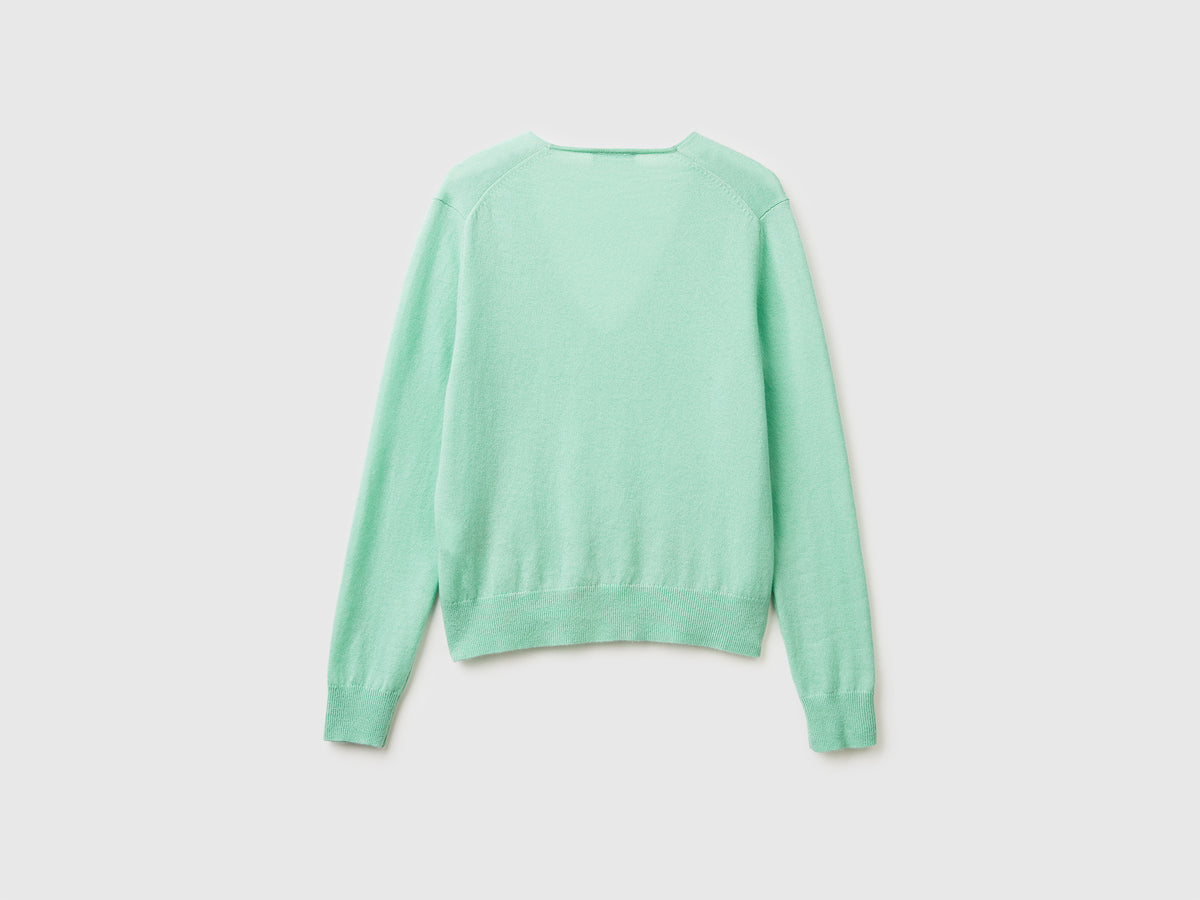 Maglione con scollo a V in pura lana Merino