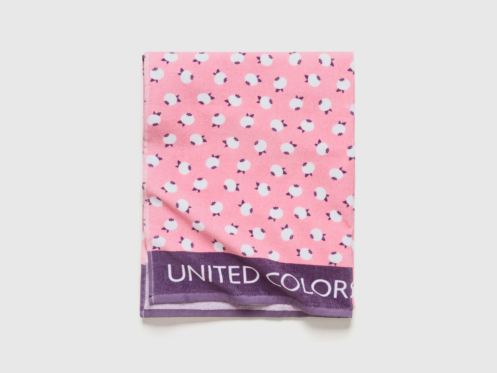 Telo mare con pattern mirtilli da bambino rosa 3 | Benetton Outlet