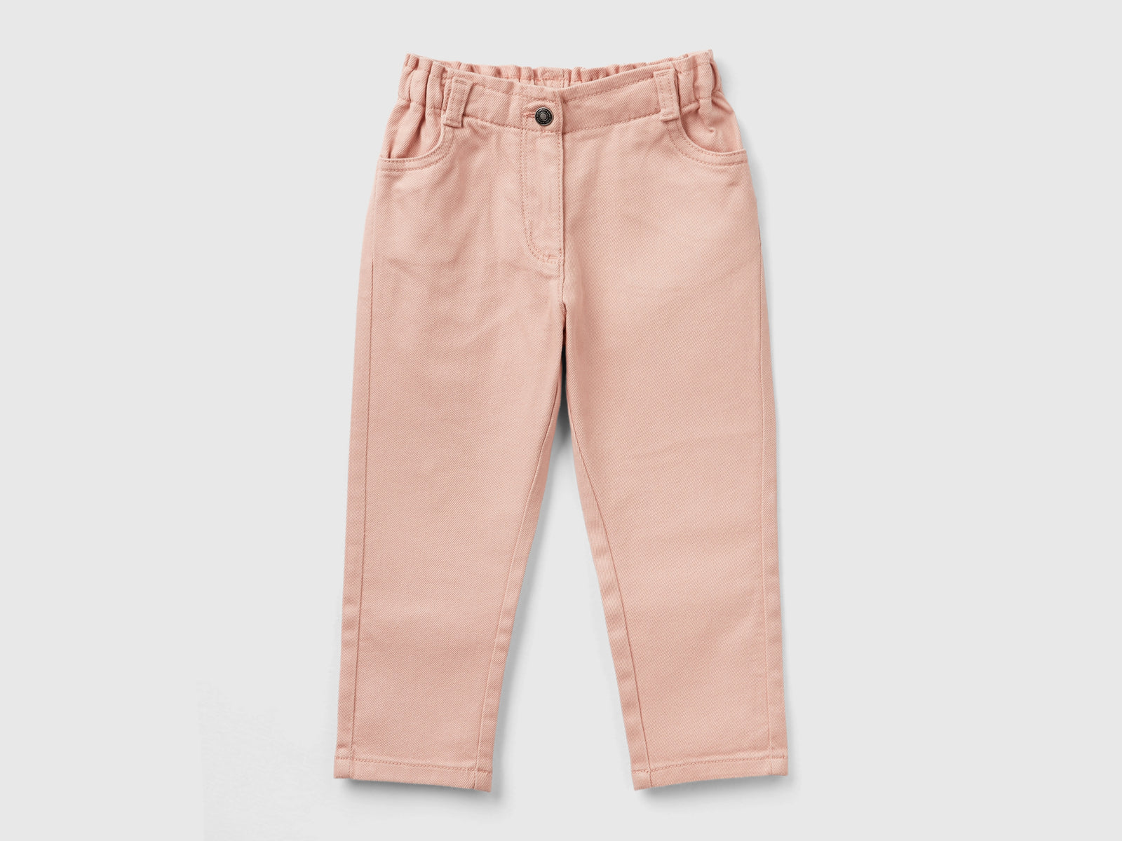 Pantaloni paperbag da bimba rosa pastello | Benetton Outlet