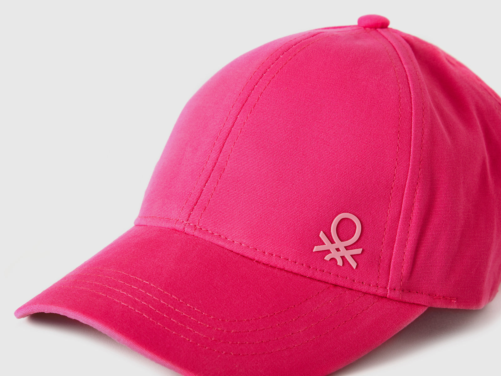 Cappellino con visiera da bimbo fucsia 3 | Benetton Outlet