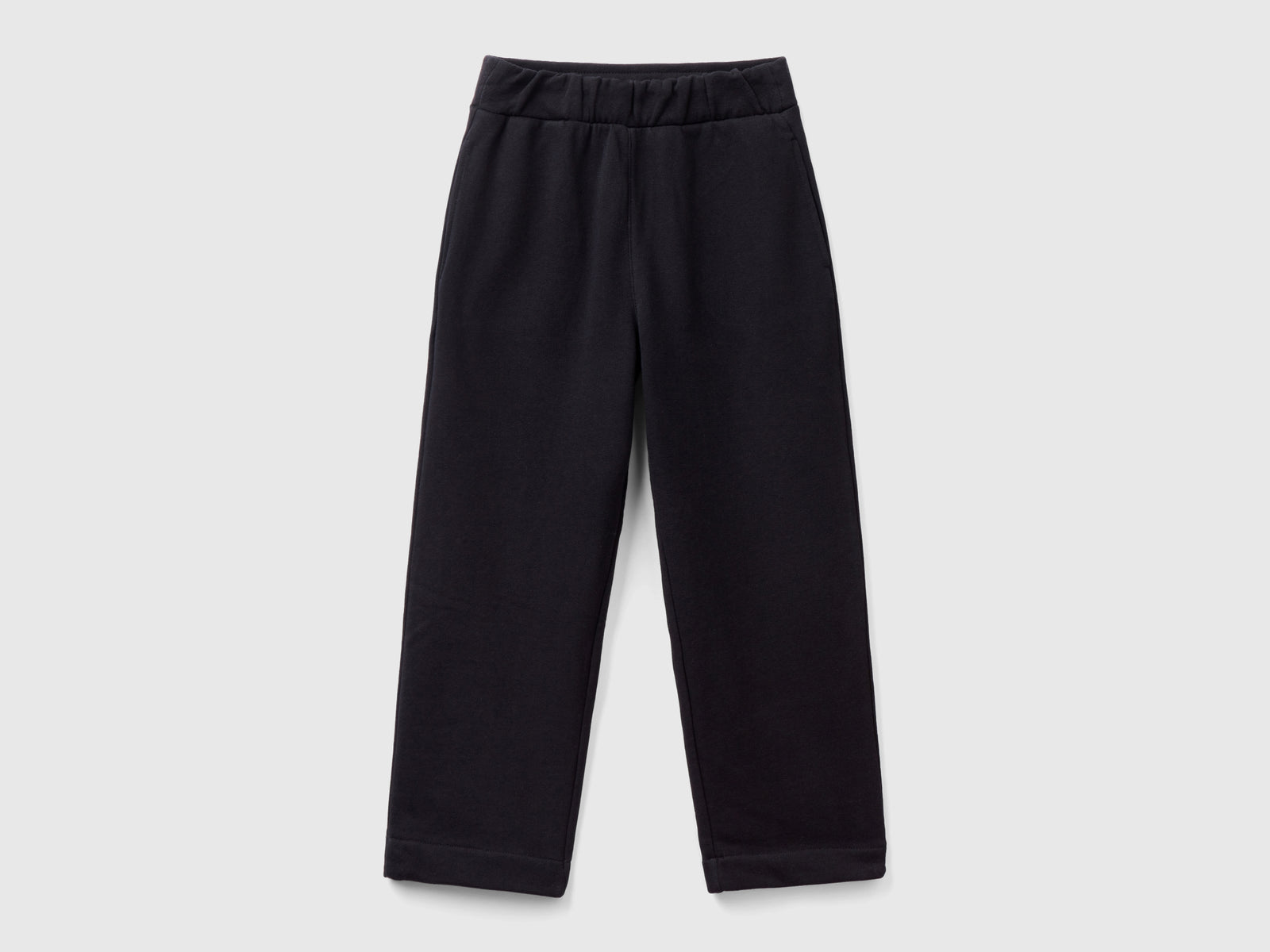 Pantaloni in felpa a vita alta da bambina nero | Benetton Outlet