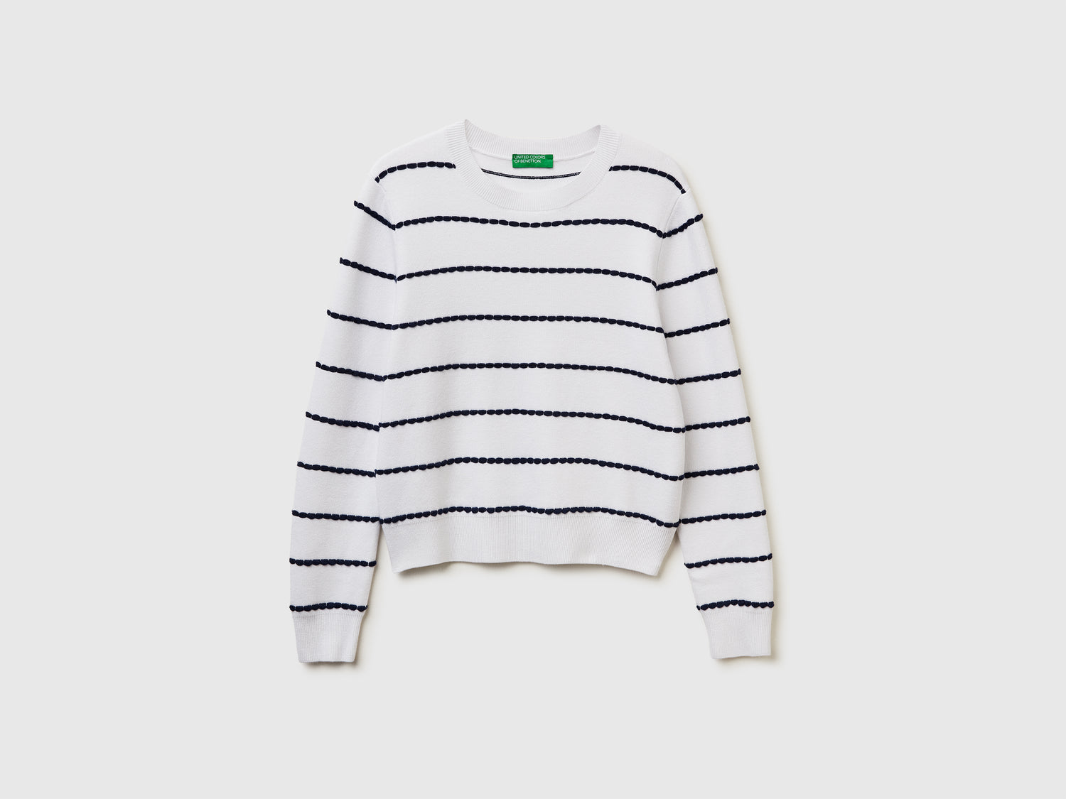 Maglia jacquard in misto viscosa da donna bianco panna | Benetton Outlet