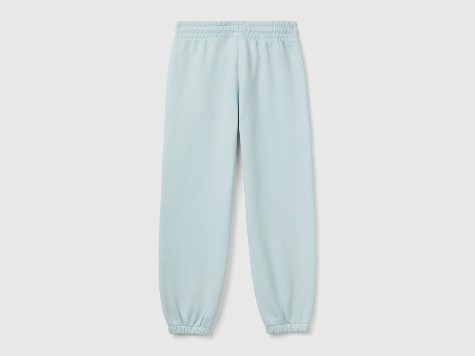 Joggers in felpa con coulisse da bambina verde acqua 2 | Benetton Outlet