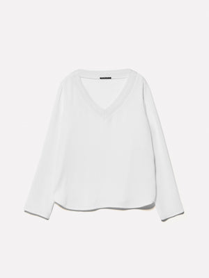 Blusa panna con scollo a contrasto