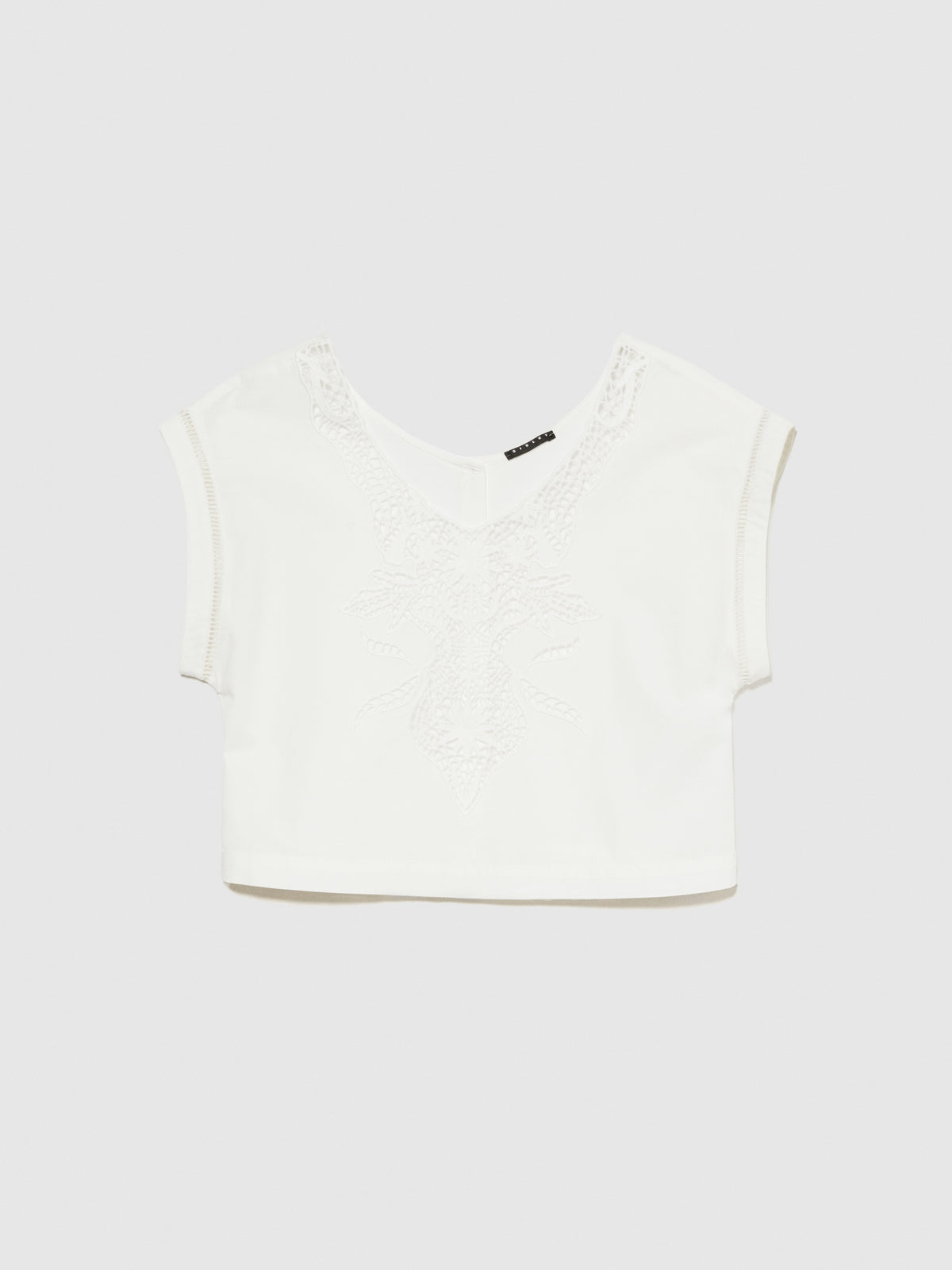 Blusa cropped con crochet