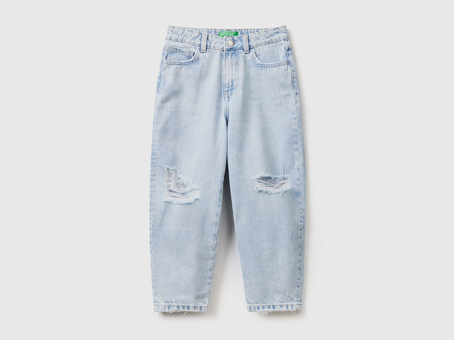 Pantaloni lunghi baggy fit in denim di puro cotone con rotture da bambina azzurro | Benetton Outlet