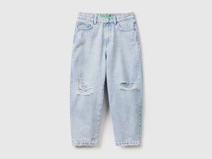 Pantaloni lunghi baggy fit in denim di puro cotone con rotture