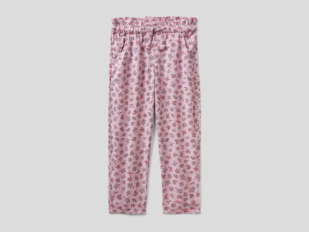 Pantaloni paperbag a fiori da bambina rosa | Benetton Outlet