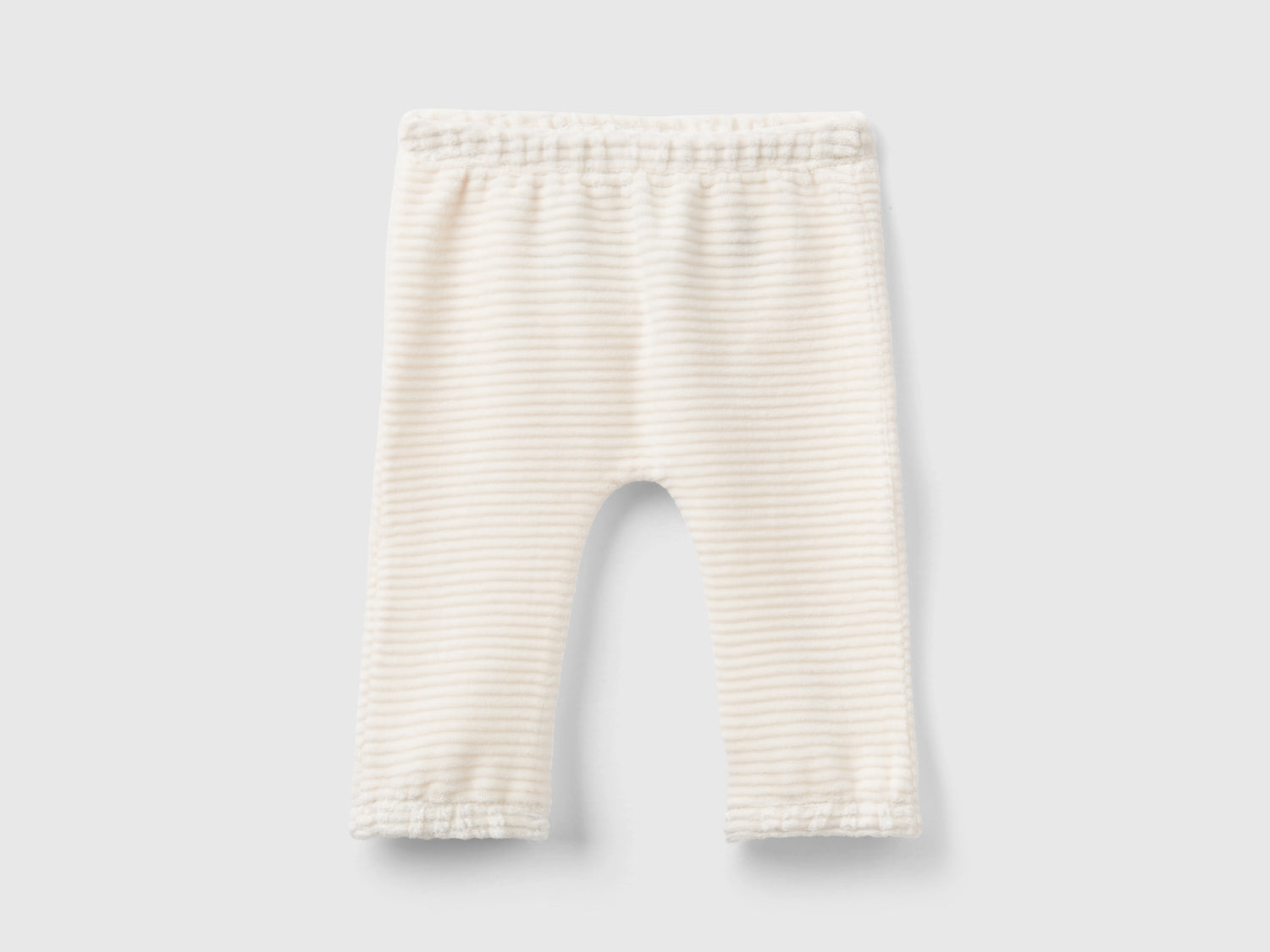 Pantaloni in ciniglia con ricamo da neonato bianco panna | Benetton Outlet
