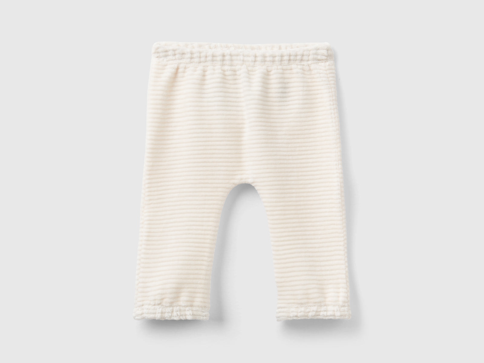 Pantaloni in ciniglia con ricamo da neonato bianco panna | Benetton Outlet