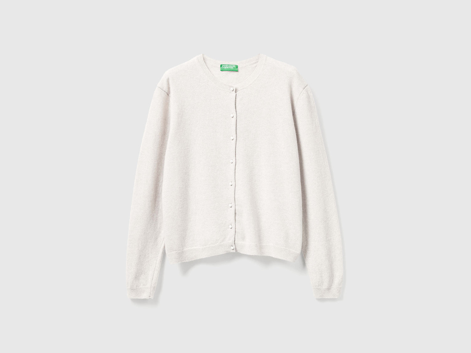 Cardigan panna in pura lana Merino da donna bianco panna | Benetton Outlet