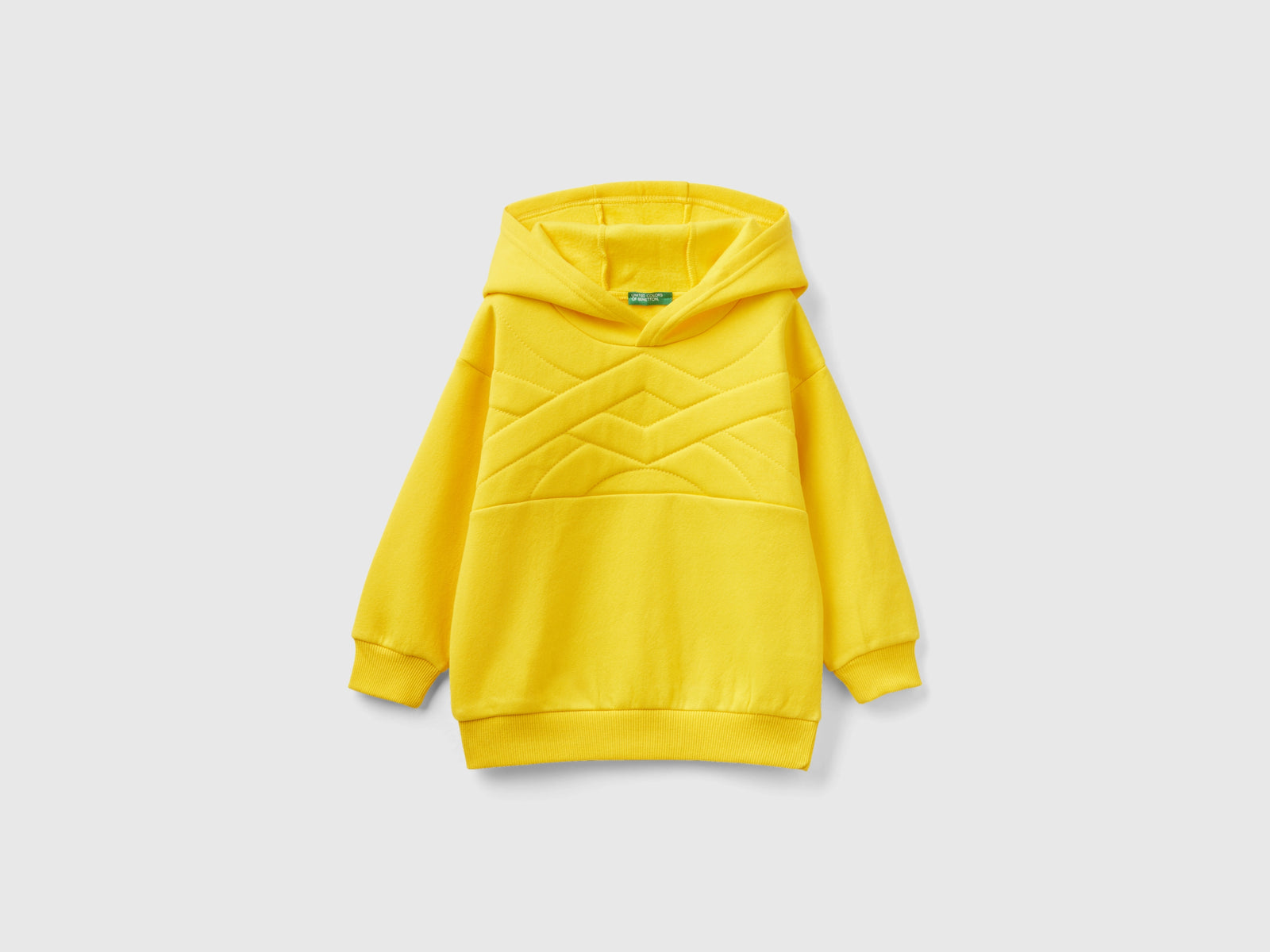 Felpa con cappuccio in tessuto riciclato da bimbo giallo | Benetton Outlet