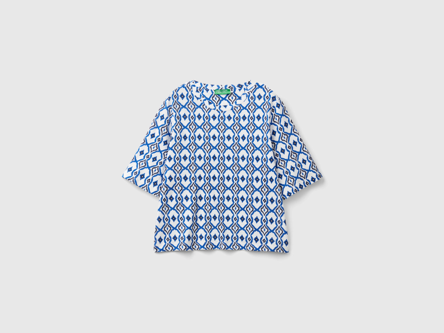 Maglietta con fantasia geometrica da donna blu | Benetton Outlet