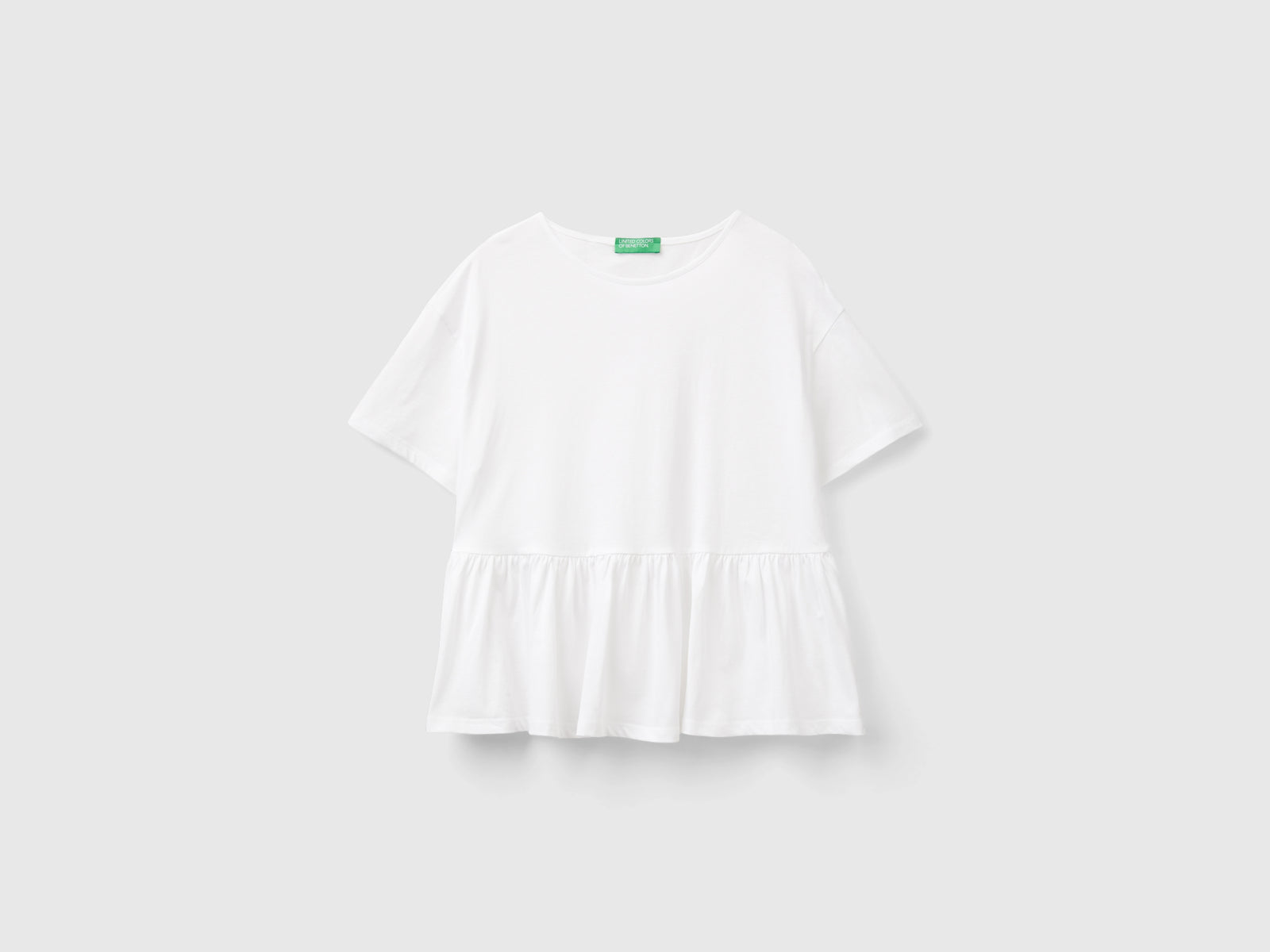 T-shirt boxy fit con balza da donna bianco | Benetton Outlet