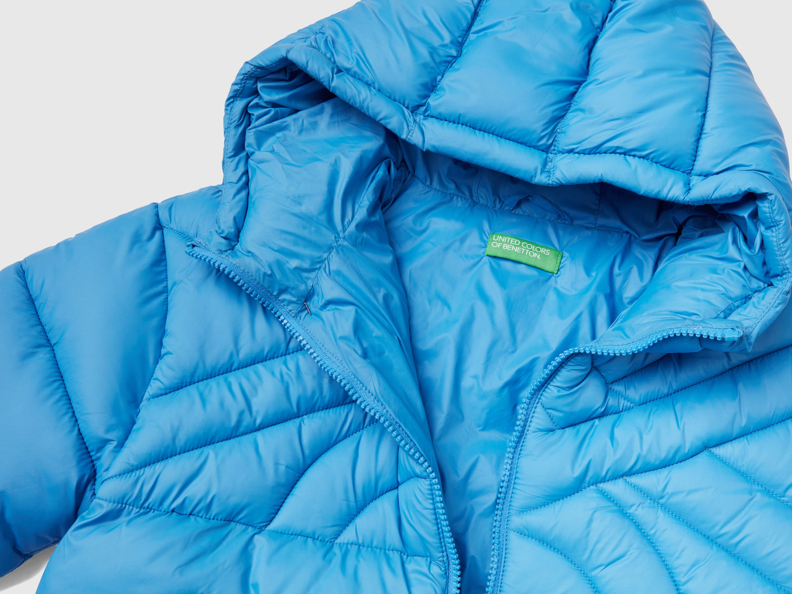 Piumino corto imbottito con ovatta riciclata da bambino azzurro 3 | Benetton Outlet
