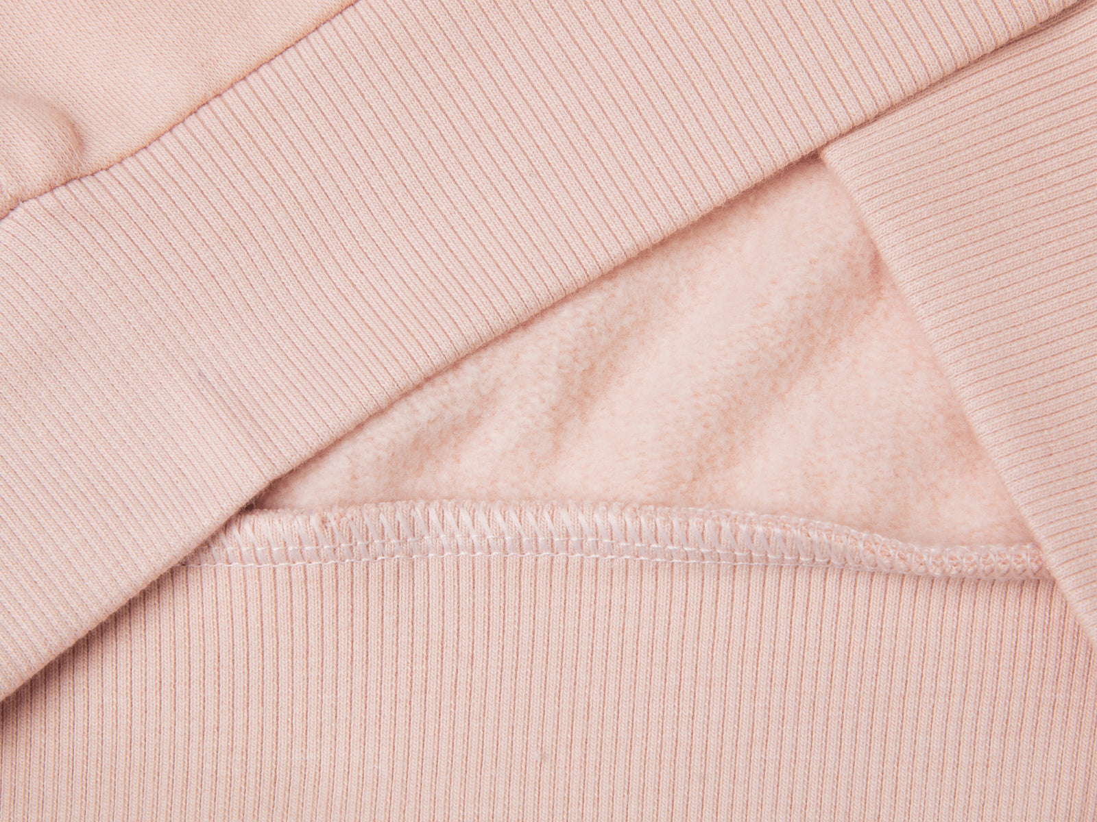 Felpa con zip e paillettes da bambina rosa tenue 3 | Benetton Outlet