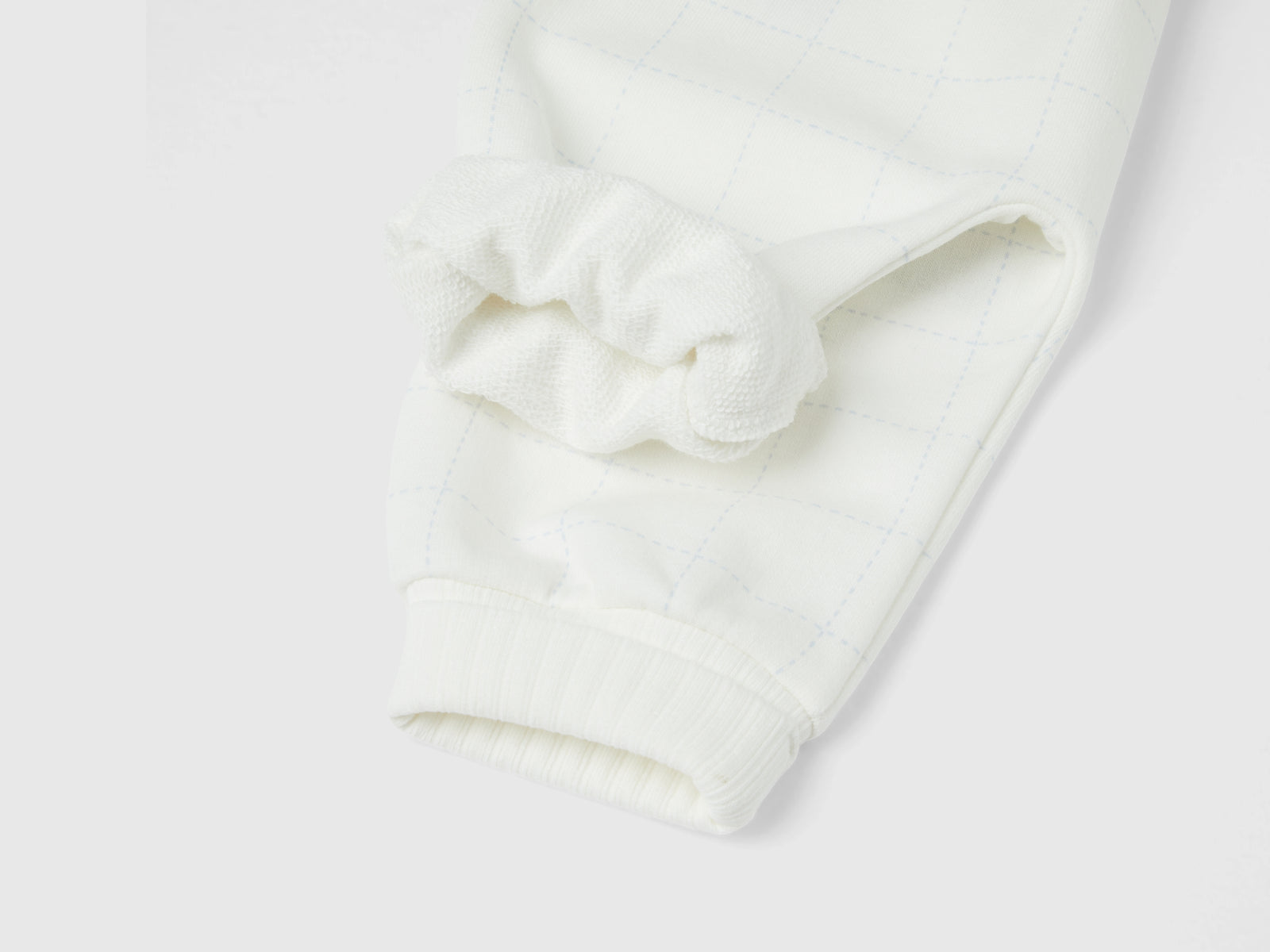 Pantaloni in felpa con bottoni da neonato bianco panna 2 | Benetton Outlet