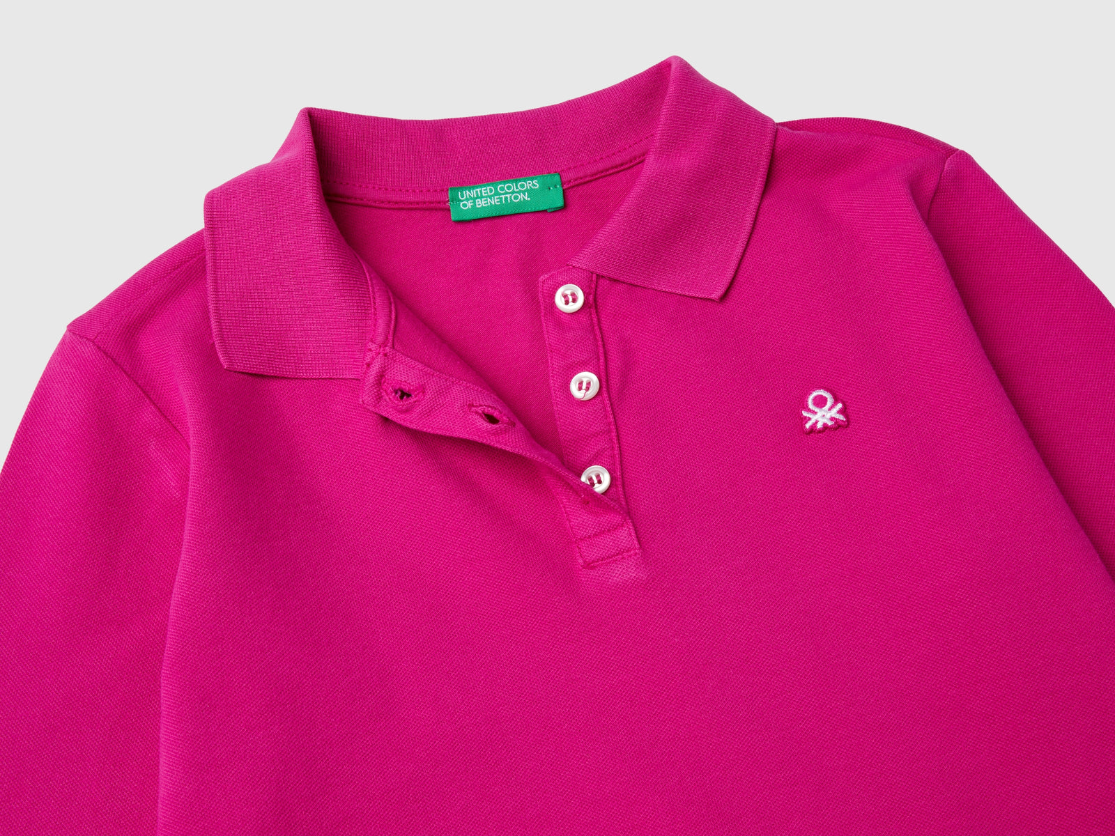 Polo manica lunga in cotone bio da bambina fucsia 3 | Benetton Outlet