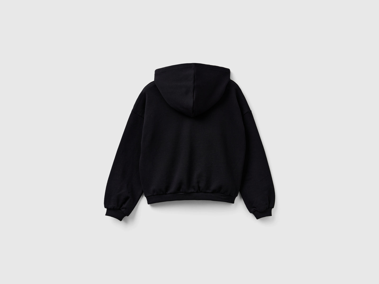 Felpa con cappuccio e maxi logo da bambina nero 2 | Benetton Outlet