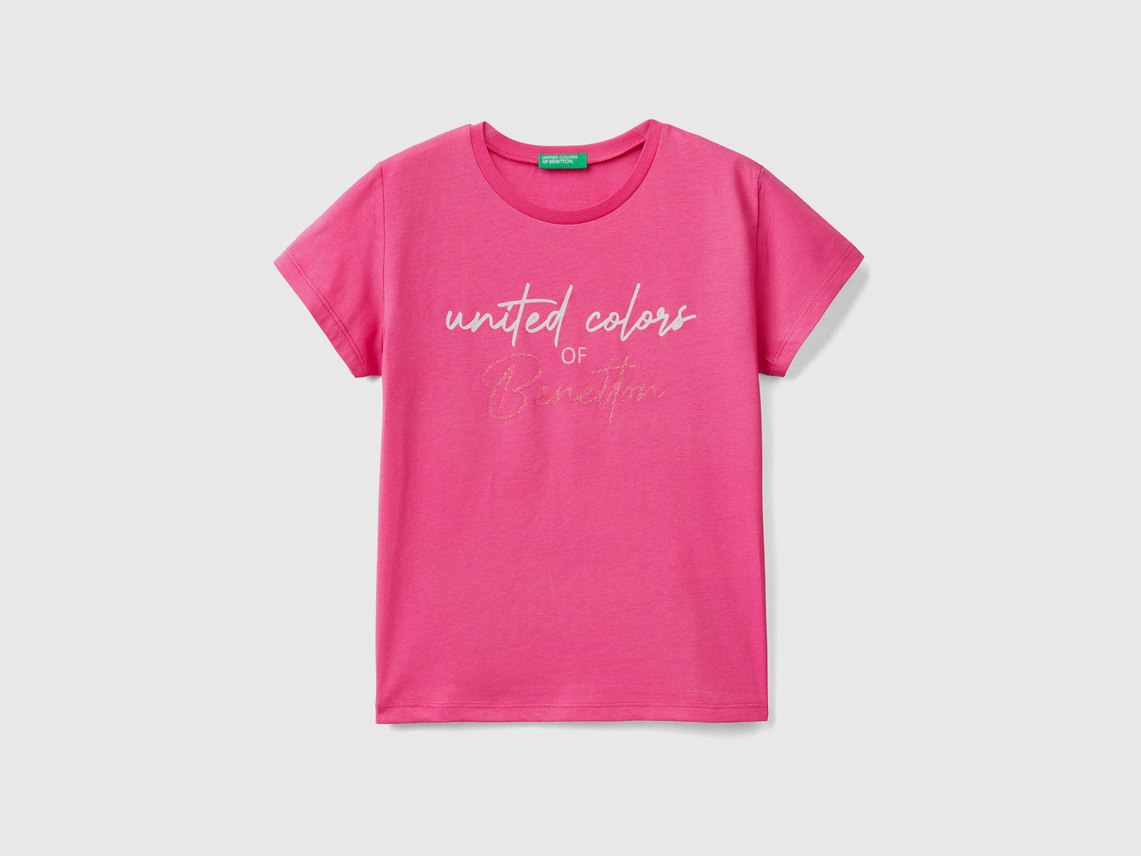 Maglietta girocollo a manica corta in puro cotone da bambina fucsia | Benetton Outlet
