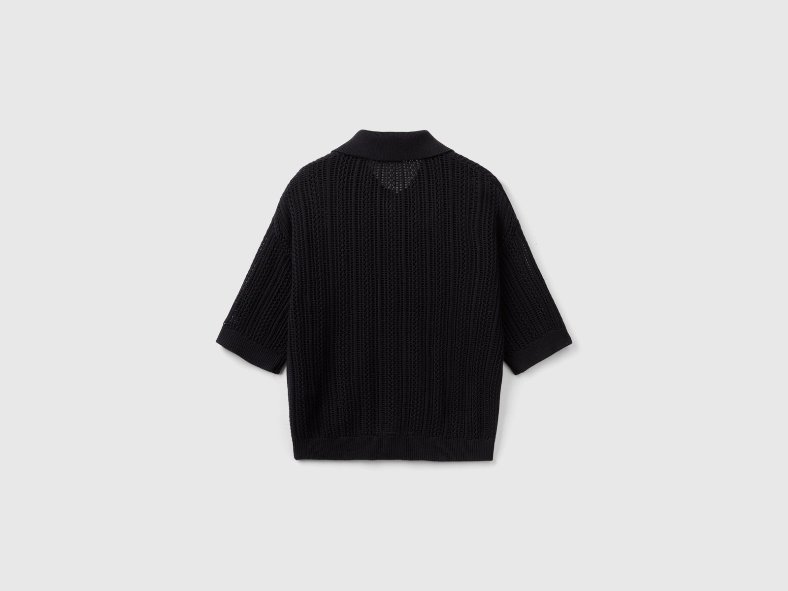 Polo in maglia crochet da donna nero 2 | Benetton Outlet