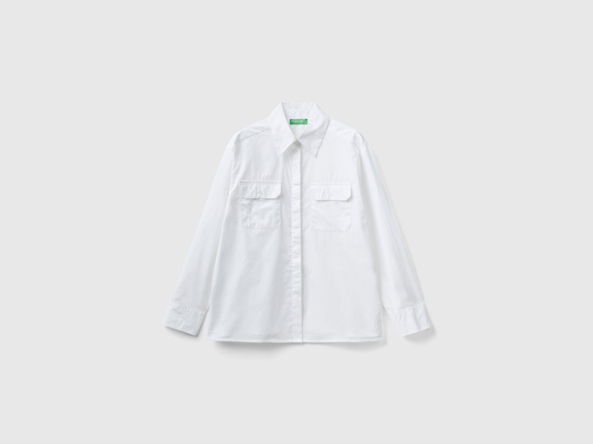 Camicia con tasche e spacchi