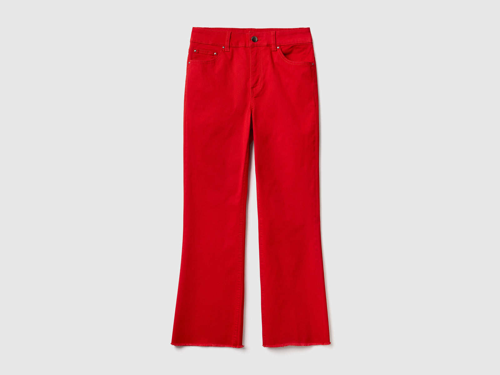 Pantaloni lunghi a trombetta in cotone elasticizzato da donna rosso | Benetton Outlet