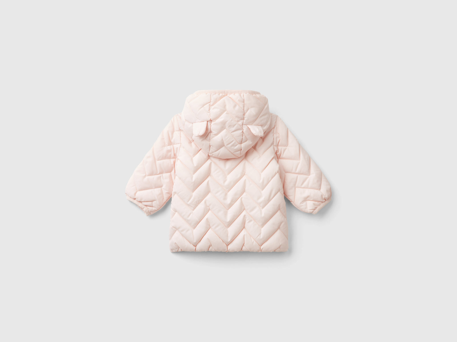 Piumino imbottito con orecchie da neonato rosa tenue 2 | Benetton Outlet