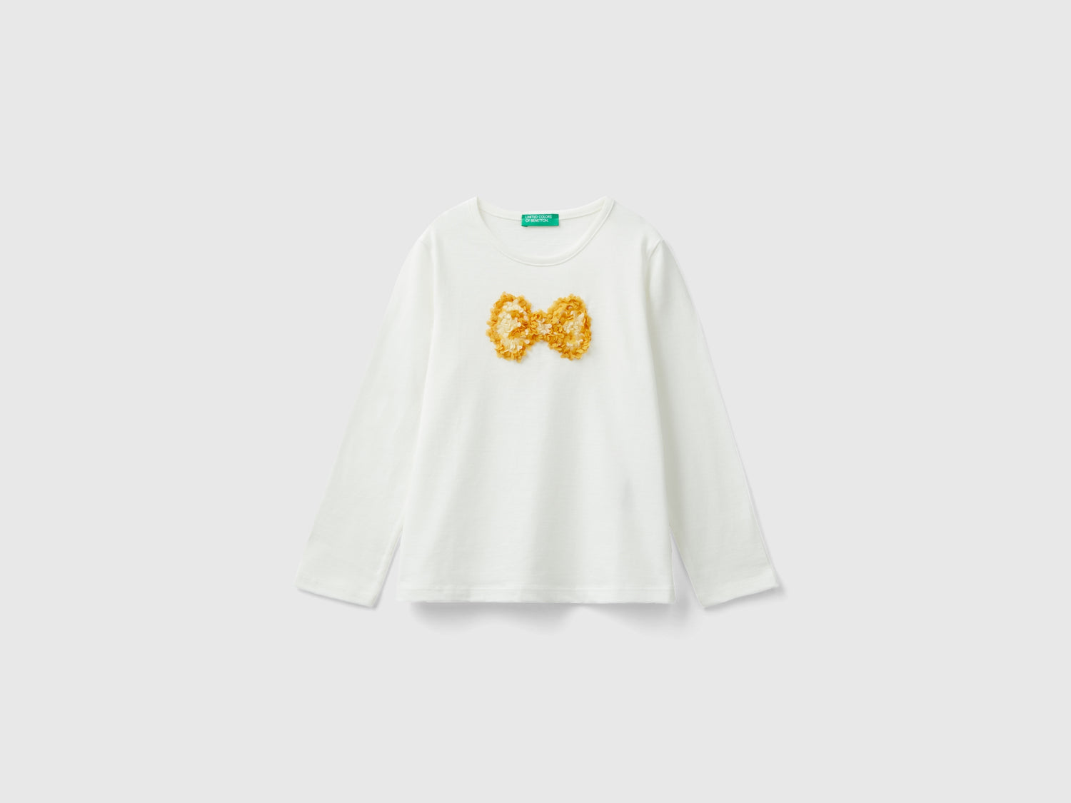 T-shirt con applicazione effetto petali da bimba bianco panna | Benetton Outlet