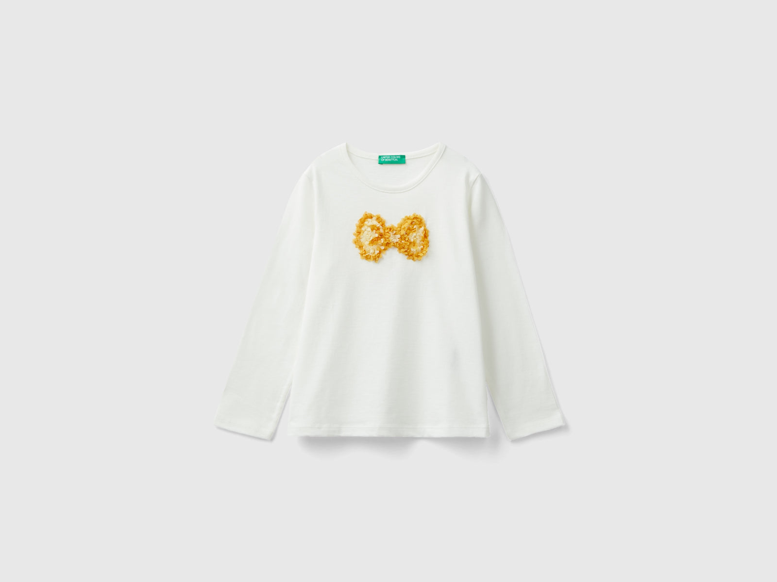 T-shirt con applicazione effetto petali da bimba bianco panna | Benetton Outlet
