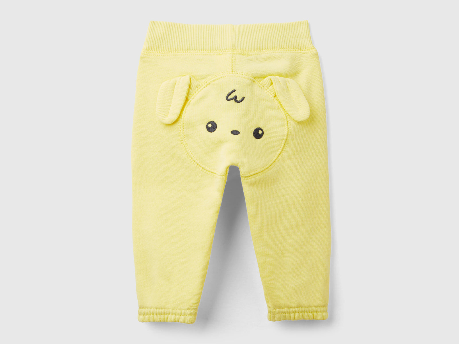 Pantaloni in felpa di cotone bio da neonato giallo 2 | Benetton Outlet
