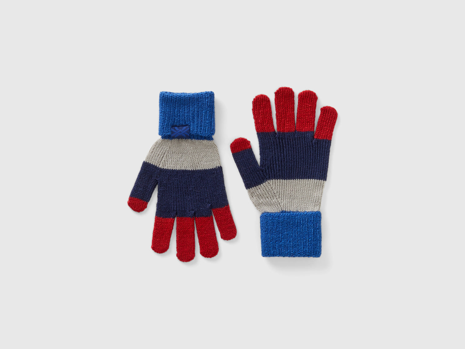 Guanti a righe da bambino rosso | Benetton Outlet