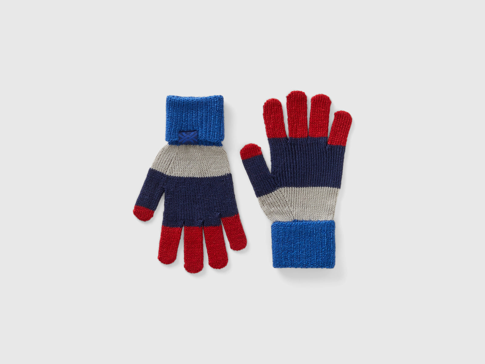 Guanti a righe da bambino rosso | Benetton Outlet
