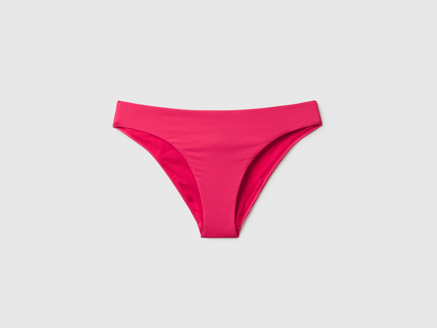 Slip costume basico in ECONYL® da donna fucsia | Benetton Outlet