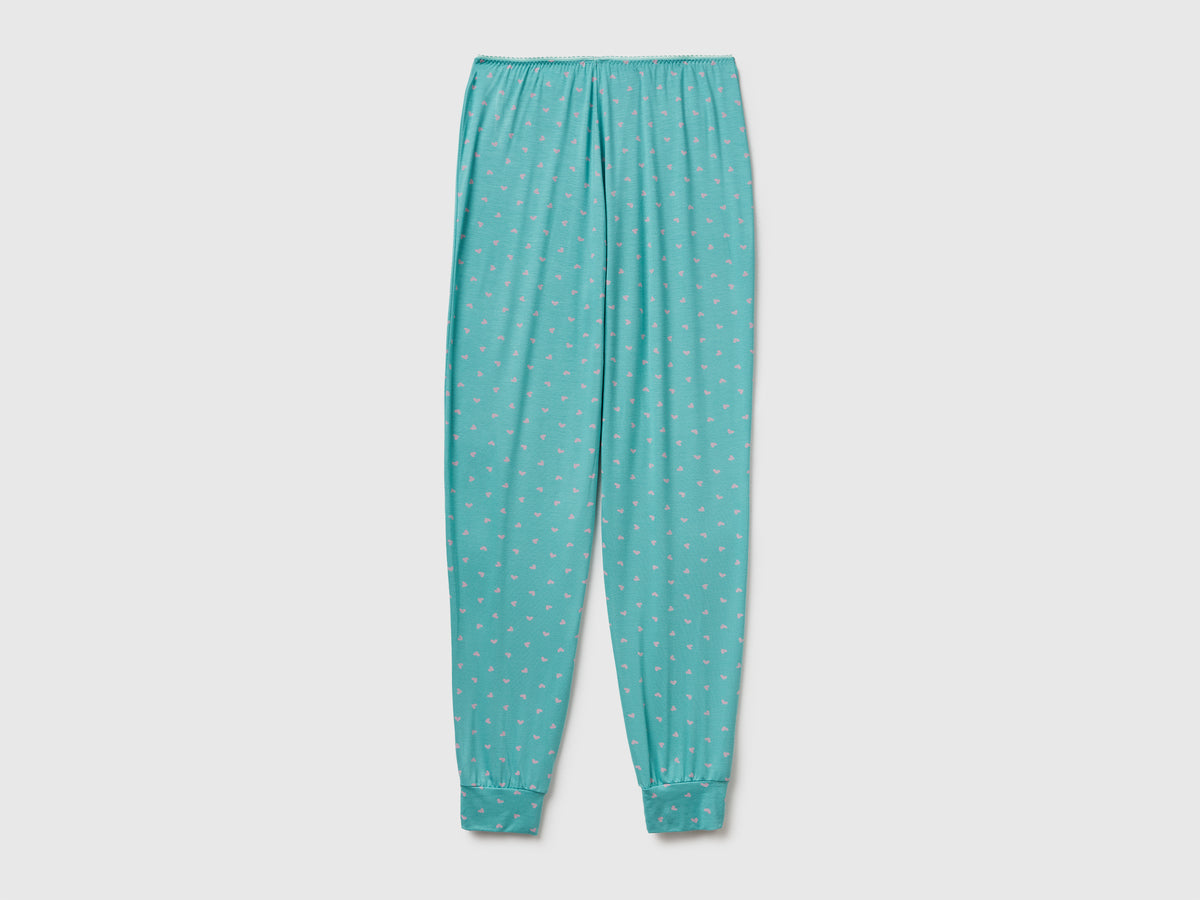 Pantaloni azzurri con stampa cuori