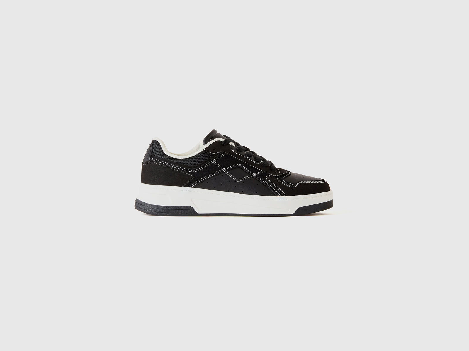 Sneakers basse da donna nero | Benetton Outlet