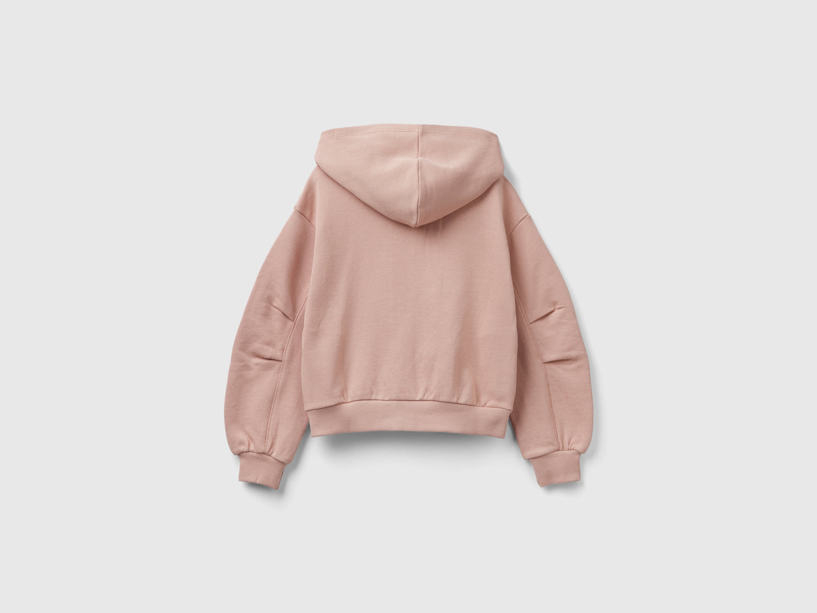 Felpa con zip e cappuccio da bambina rosa tenue 2 | Benetton Outlet
