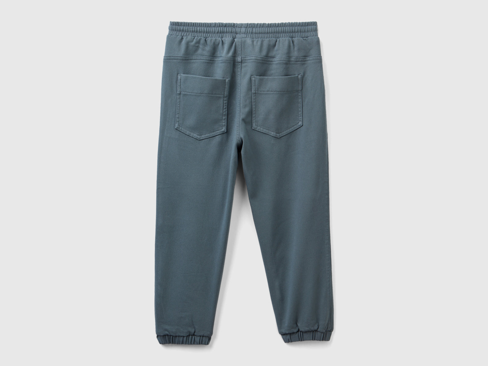 Joggers con coulisse e maxi tasche da bambino grigio scuro 2 | Benetton Outlet