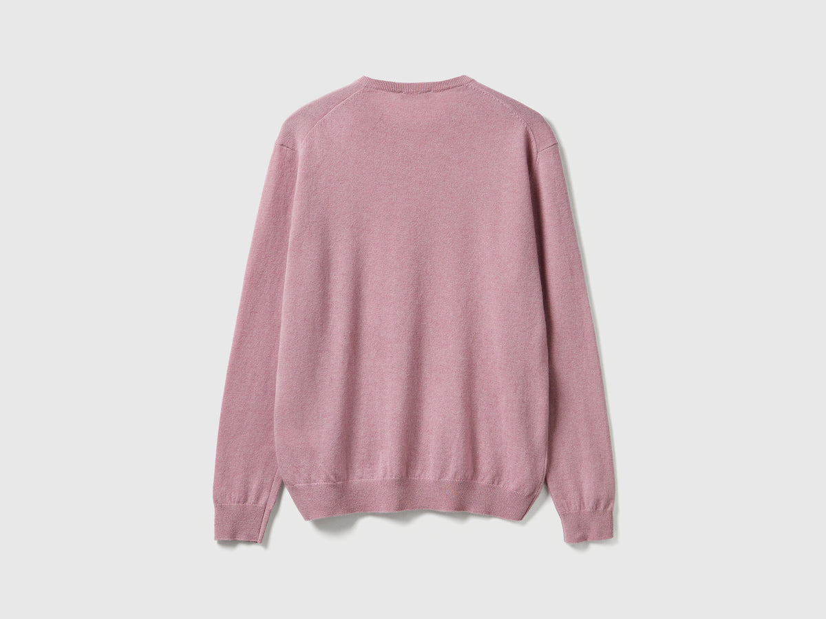 Maglia girocollo rosa mélange in pura lana Merino