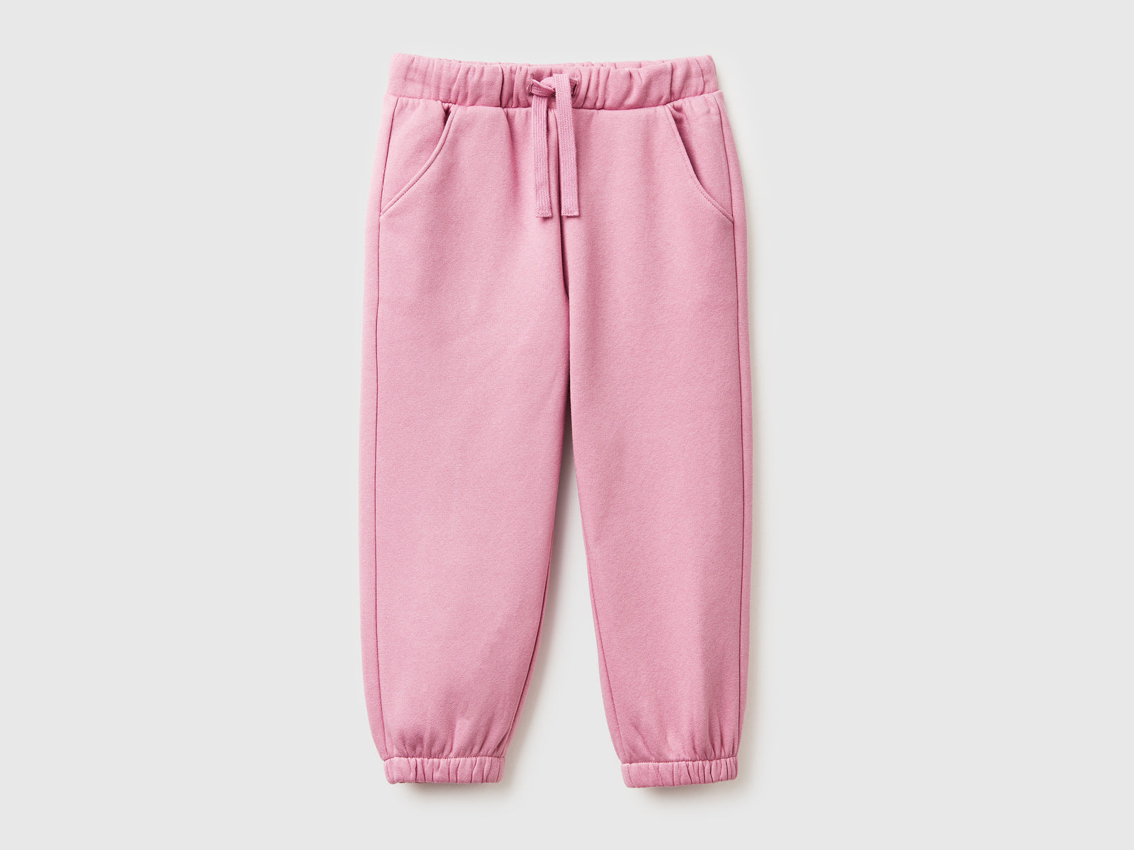 Joggers in felpa con coulisse da bimba rosa | Benetton Outlet